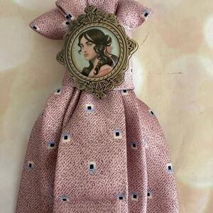 Elegant Portrait Brooch on upcycled tie necklace